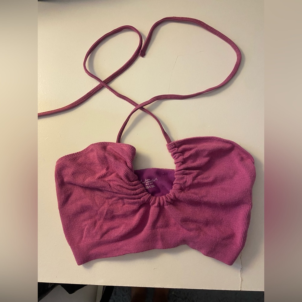 out from under Urban Outfitters top